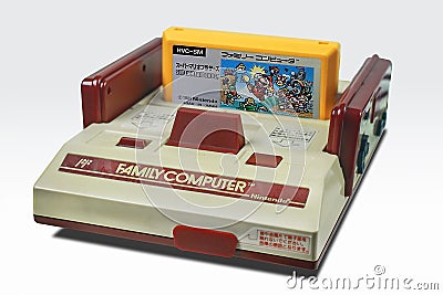 THE VINTAGE VIDEO GAME FAMILY COMPUTER AND MARIO GAME BY NINTENDO. 9 AUGUST 2020, BANGKOK, THAILAND Editorial Stock Photo
