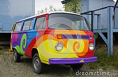 A vintage Volkswagen (VW) camper van painted with psychedelic hippy colors Editorial Stock Photo