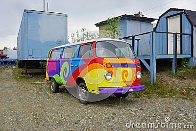 A vintage Volkswagen (VW) camper van painted with psychedelic hippy colors Editorial Stock Photo