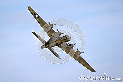 Vintage warbird US Air Force Boeing B-17 Flying Fortress WW2 bomber plane perforing at the Sanice Sunset Airshow. Belgium - Editorial Stock Photo