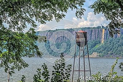 Vintage Water Tower on the Hudson River Stock Photo