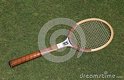 Vintage Wilson Chris Evert tennis racket on the grass tennis court. Editorial Stock Photo