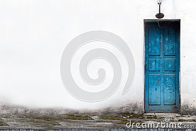 Vintage Wooden Door in White Wall Stock Photo