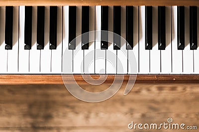 Vintage wooden piano keys, wooden blurry floor Stock Photo