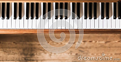 Vintage wooden piano keys, wooden blurry floor Stock Photo