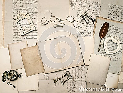 Vintage writing accessories, old letters and frames Stock Photo