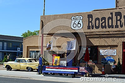 Vintage Yelllow Car at Roadrunner Store, Route 66, Seligman, Arizona, USA Editorial Stock Photo