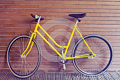 Vintage yellow bike Stock Photo