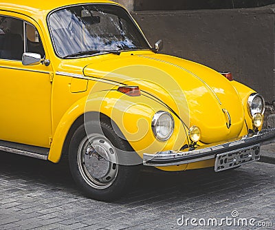 vintage yellow car parked outdoors. retro style. antique vehicle Editorial Stock Photo