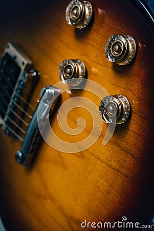 Vintage yellow electric guitar Stock Photo