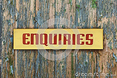 Vintage yellow with red enquiry placard Stock Photo