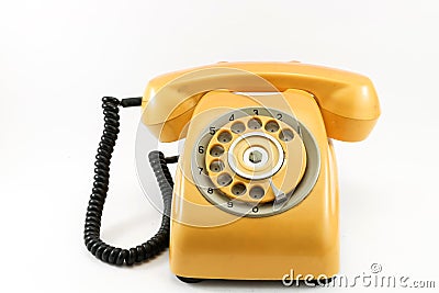 Vintage yellow telephone Stock Photo