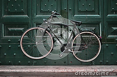 Vintaged bicycle suspended Stock Photo