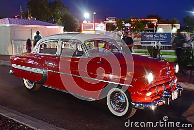 Vintange red car in Saturday Nite Classic Car Show and Cruise at Old Town Kissimmee. Editorial Stock Photo