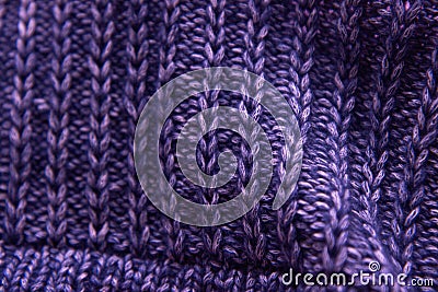Violet knitted woolen fabric texture. Background. Needlework as background Stock Photo