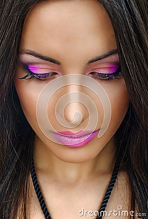 Violet lips and eyelids Stock Photo