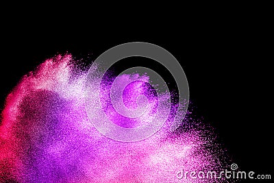 Violet pink powder explosion cloud isolated on black background. Stock Photo