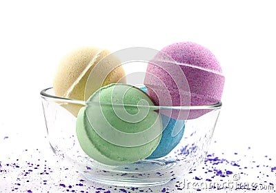 Violet salt and multicoloured bath balls Stock Photo