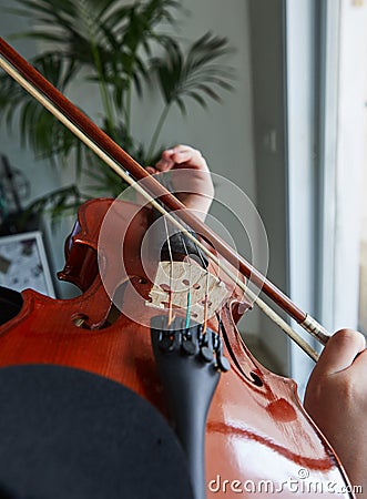 Classical player hands. Details of violin playing Stock Photo