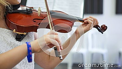 Violin classic musical instrument. Classical player hands. Details of violin Stock Photo