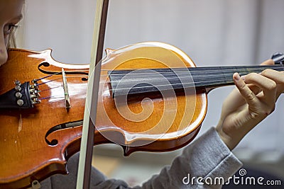 Violin lesson, correct hand position and bow, horizontal format Stock Photo