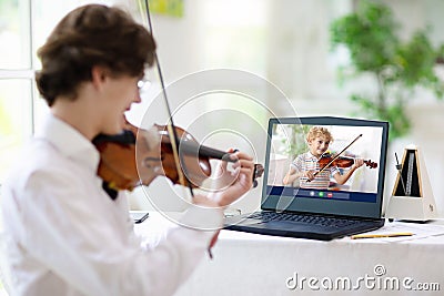 Violin lesson online. Music remote tuition Stock Photo