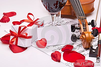 Violin, notes and red wine. Stock Photo