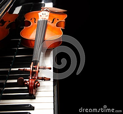 Violin on the piano Stock Photo