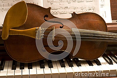 Violin On Piano Keys Stock Photo