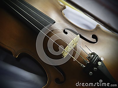 Violin put on background,show detail of acoustic instrument Stock Photo