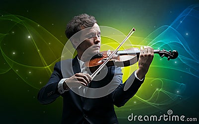 Violinist with colorful fabled concept Stock Photo