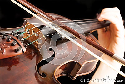 A violinist playing a violin Stock Photo