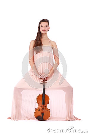 Violinist posing with violin Stock Photo