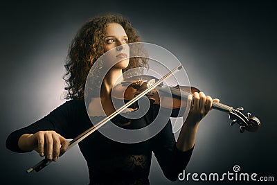 Violinist woman with violin Stock Photo