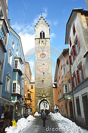 VIPITENO, ITALY - JANUARY 23, 2018: ZwÃ¶lferturm tower in main street of the old medieval town of Vipiteno Sterzing, South Tyrol Editorial Stock Photo