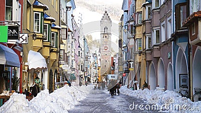 VIPITENO, ITALY - JANUARY 23, 2018: ZwÃ¶lferturm tower in main street of the old medieval town of Vipiteno Sterzing, South Tyrol Editorial Stock Photo