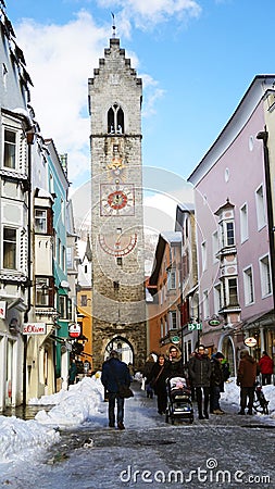 VIPITENO, ITALY - JANUARY 23, 2018: ZwÃ¶lferturm tower in main street of the old medieval town of Vipiteno Sterzing, South Tyrol Editorial Stock Photo