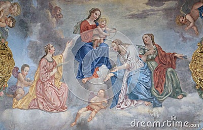 Virgin Mary with the baby Jesus surrounded by saints and angels Editorial Stock Photo