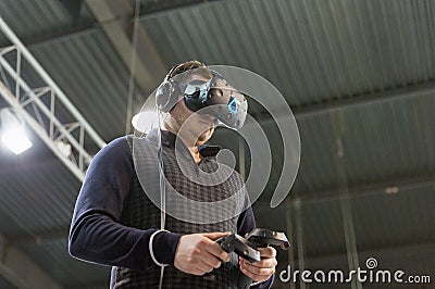 Virtual reality game on Kiev Plug-in Ukraine 2017 Exhibition. Editorial Stock Photo