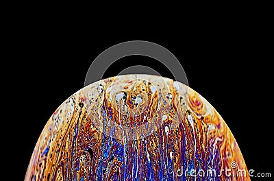 Virtual reality space with abstract multicolor psychedelic planet. Closeup Soap bubble like an alien planet on black background Stock Photo