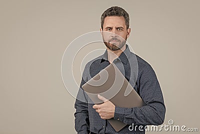 Virtually connected. Unshaven man hold laptop. Online courses. Online ccommunication Stock Photo