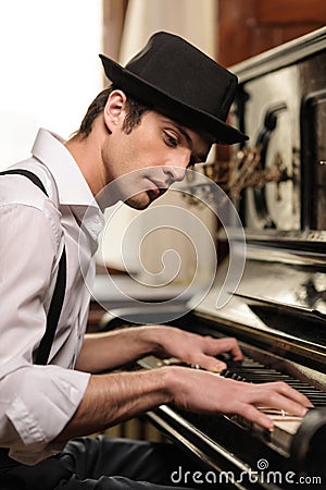 Virtuoso playing piano Stock Photo