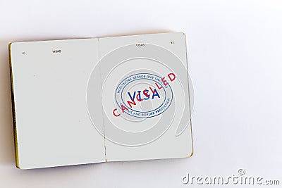 Visa cancelled stamp in passport Stock Photo