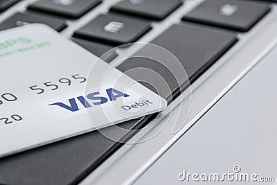 Visa Card on a laptop keyboard Editorial Stock Photo