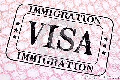 Visa document immigration stamp passport page closeup Stock Photo