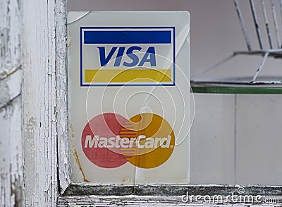 VISA and Mastercard fading signs Editorial Stock Photo