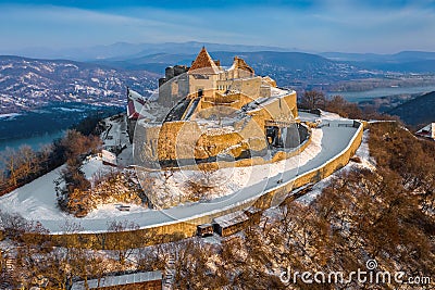 Visegrad, Hungary - Aerial view of the beautiful snowy high castle of Visegrad at sunrise on a winter morning Stock Photo