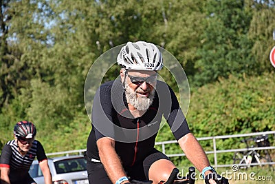 Male triathlete riding his bike 2 Editorial Stock Photo