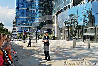 Visit of the royal couple in Warsaw. People holding Union Jack flags and flowers Editorial Stock Photo