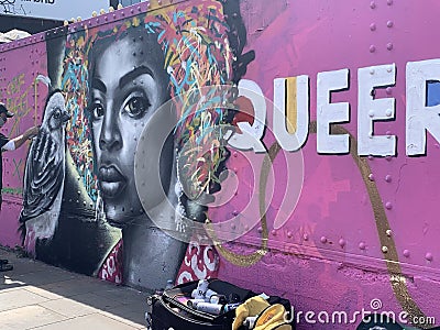 Large colorful queer graffiti art on the streets of Shoreditch East London Uk Editorial Stock Photo